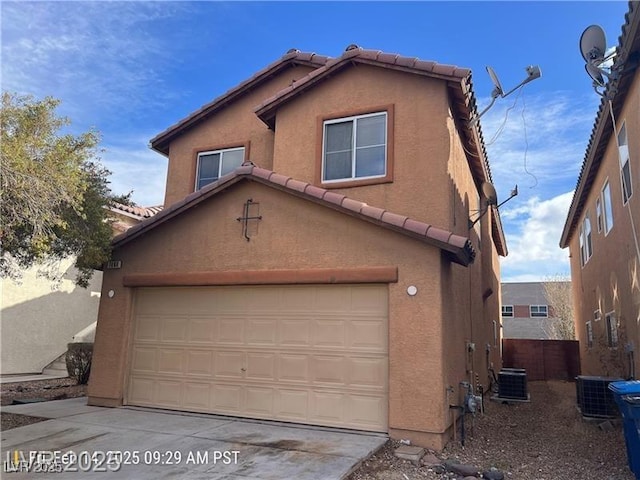 7464 Edgecove Ct, Las Vegas, NV 89139 - view of front of home with a tile roof, stucco siding, and cooling unit