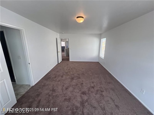7464 Edgecove Ct, Las Vegas, NV 89139 - empty room featuring carpet flooring and baseboards