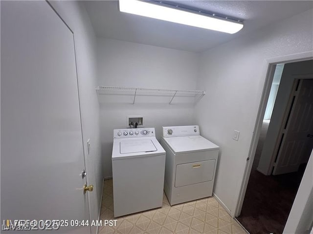 7464 Edgecove Ct, Las Vegas, NV 89139 - laundry room featuring washer and dryer and light floors