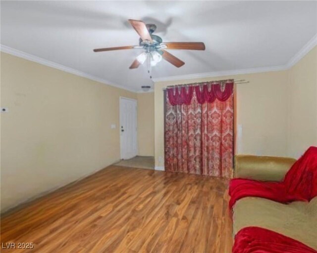 3135 S Mojave Rd Unit 113, Las Vegas, NV 89121 - sitting room with crown molding, wood finished floors, and ceiling fan