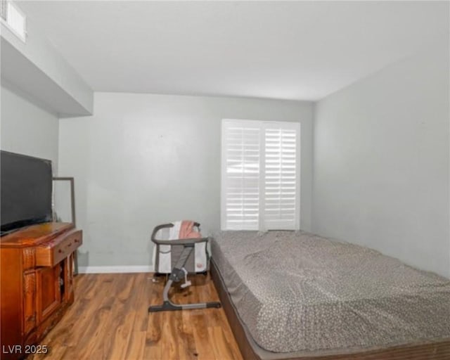 3135 S Mojave Rd Unit 113, Las Vegas, NV 89121 - bedroom with wood finished floors
