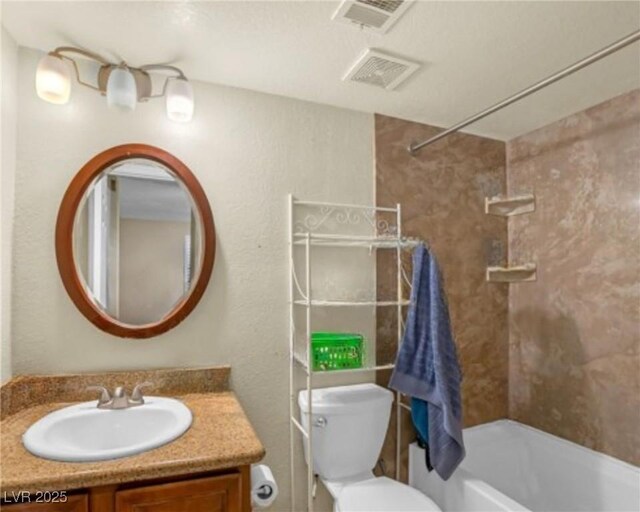 3135 S Mojave Rd Unit 113, Las Vegas, NV 89121 - full bathroom featuring vanity, toilet, and bathing tub / shower combination