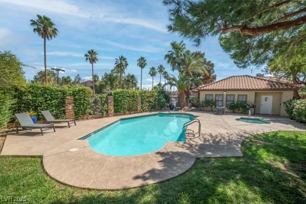3135 S Mojave Rd Unit 113, Las Vegas, NV 89121 - view of swimming pool featuring a patio area