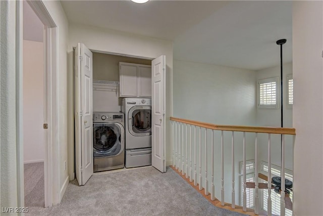 108 Broken Rock Dr, Henderson, NV 89074 - laundry room with washer and dryer, cabinet space, and carpet floors