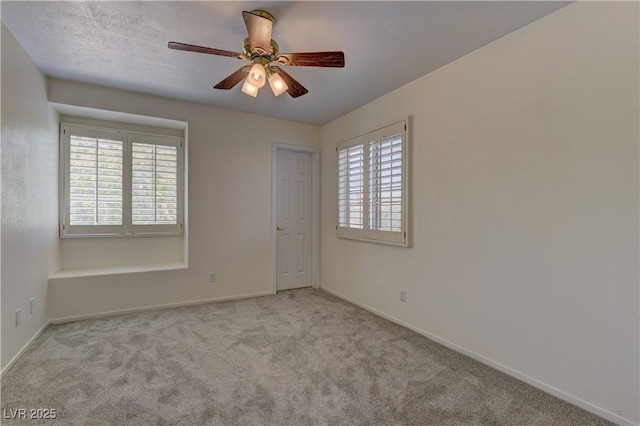 108 Broken Rock Dr, Henderson, NV 89074 - carpeted spare room with baseboards and a ceiling fan