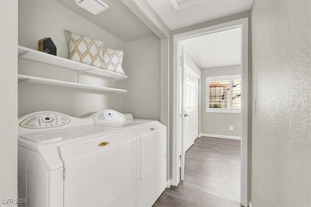 3053 Anchor Chain Dr, Las Vegas, NV 89128 - washroom with separate washer and dryer, dark wood finished floors, and baseboards