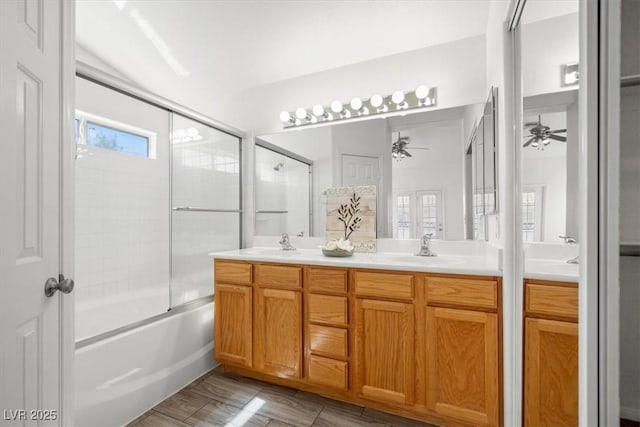 5201 S Torrey Pines Dr Unit 1221, Las Vegas, NV 89118 - full bathroom with ceiling fan, double vanity, and enclosed tub / shower combo