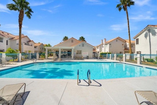 5201 S Torrey Pines Dr Unit 1221, Las Vegas, NV 89118 - community pool with a residential view and a patio