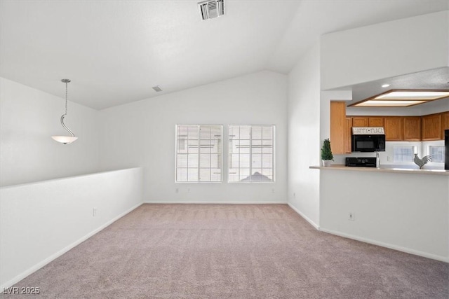 5201 S Torrey Pines Dr Unit 1221, Las Vegas, NV 89118 - unfurnished living room featuring vaulted ceiling, light carpet, and baseboards