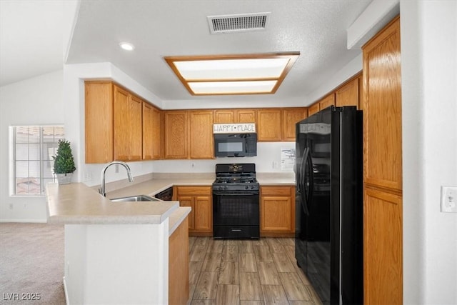 5201 S Torrey Pines Dr Unit 1221, Las Vegas, NV 89118 - kitchen featuring black appliances, a sink, a peninsula, light countertops, and recessed lighting