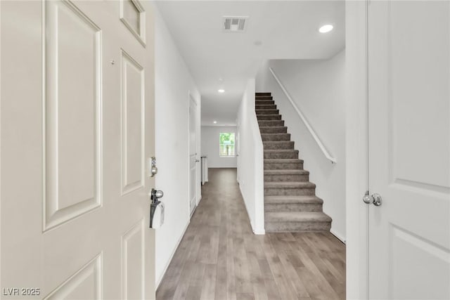 7977 Whisper Words Ave, Las Vegas, NV 89113 - entrance foyer with light wood-style floors, recessed lighting, stairs, and baseboards