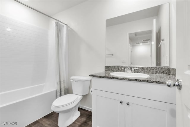 7977 Whisper Words Ave, Las Vegas, NV 89113 - full bathroom featuring vanity, toilet, wood finished floors, and shower / tub combo