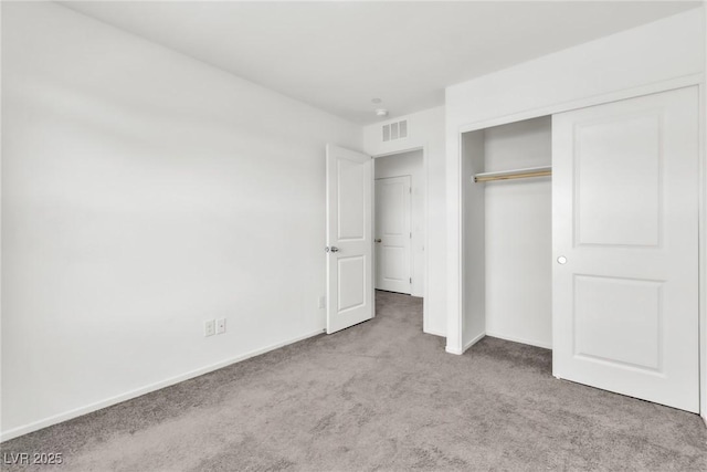 7977 Whisper Words Ave, Las Vegas, NV 89113 - unfurnished bedroom with carpet flooring, baseboards, and a closet