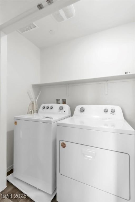 7977 Whisper Words Ave, Las Vegas, NV 89113 - washroom with washing machine and dryer and dark wood-style flooring