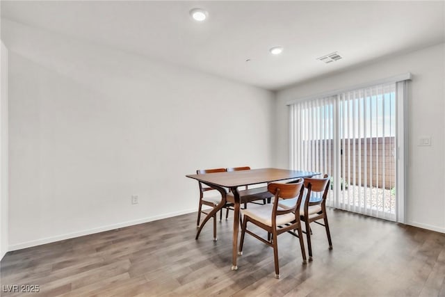 7977 Whisper Words Ave, Las Vegas, NV 89113 - dining room with wood finished floors, baseboards, and recessed lighting