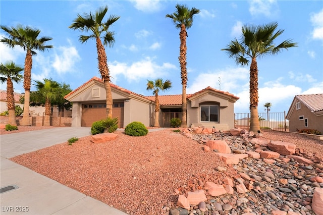 3157 Faiss Dr, Las Vegas, NV 89134 - view of front facade with concrete driveway, stucco siding, a garage, and a tile roof