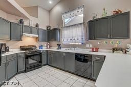 6143 Basilone Ave, Las Vegas, NV 89122 - kitchen with black appliances, light countertops, light tile patterned flooring, exhaust hood, and gray cabinets