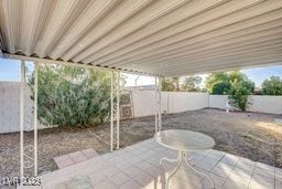 6143 Basilone Ave, Las Vegas, NV 89122 - fenced backyard featuring a patio area