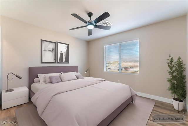 1512 Groom Ave, North Las Vegas, NV 89081 - bedroom featuring wood finished floors, baseboards, and a ceiling fan