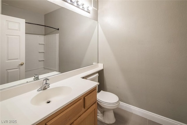 10291 Delta View Ct Unit 101, Las Vegas, NV 89129 - full bath featuring vanity, toilet, baseboards, tile patterned floors, and bathtub / shower combination