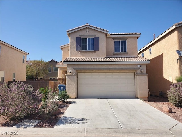 9120 Landons Point Ct, Las Vegas, NV 89148 - view of front of home with a tiled roof, stucco siding, an attached garage, and driveway