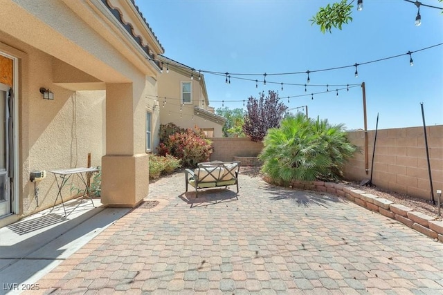 6247 Sugartree Ave, Las Vegas, NV 89141 - fenced backyard featuring a patio