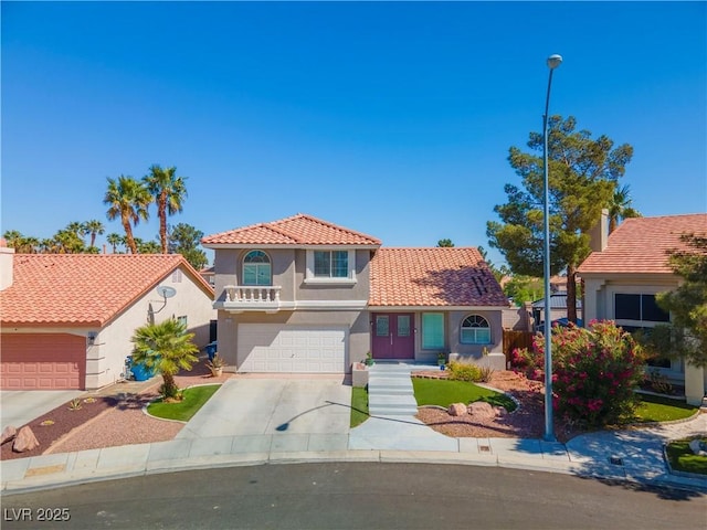 2080 Silver Breeze Ave, Las Vegas, NV 89183 - view of front of house featuring stucco siding, driveway, a tile roof, and an attached garage