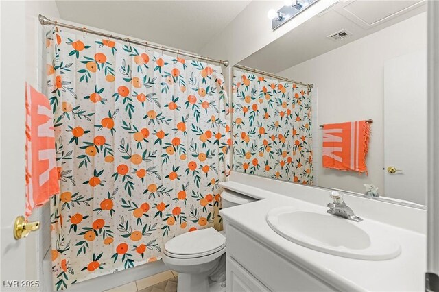 2080 Silver Breeze Ave, Las Vegas, NV 89183 - full bathroom with vanity, toilet, tile patterned floors, and a shower with shower curtain