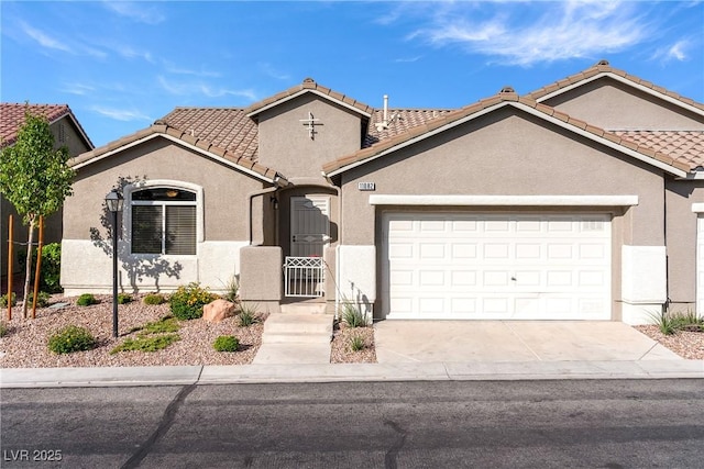 11082 Sospel Pl, Las Vegas, NV 89141 - view of front of house with stucco siding, an attached garage, a tiled roof, driveway, and a gate