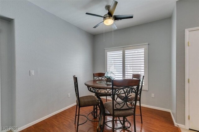 9362 Straw Hays St Unit 103, Las Vegas, NV 89178 - dining area featuring wood finished floors, baseboards, and ceiling fan