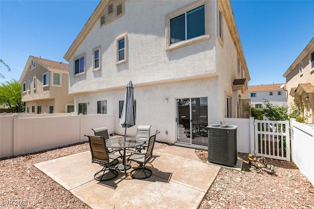 9362 Straw Hays St Unit 103, Las Vegas, NV 89178 - fenced backyard featuring central AC unit and a patio area