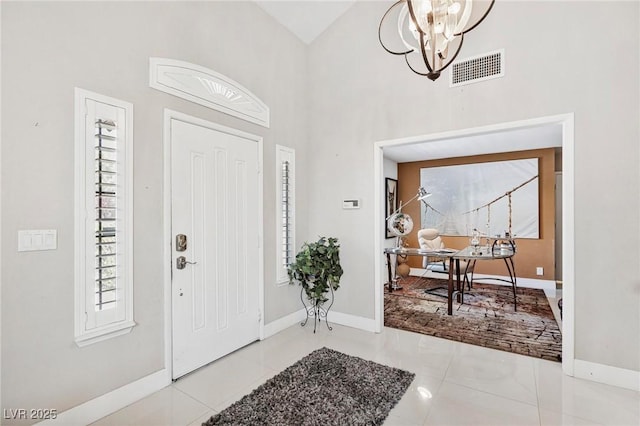 2222 Lucerne Ct, Henderson, NV 89014 - tiled entrance foyer with a chandelier, baseboards, and high vaulted ceiling