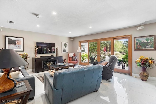 2222 Lucerne Ct, Henderson, NV 89014 - living room with recessed lighting, light tile patterned floors, and baseboards