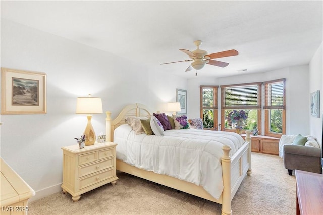 2222 Lucerne Ct, Henderson, NV 89014 - bedroom with light colored carpet and a ceiling fan