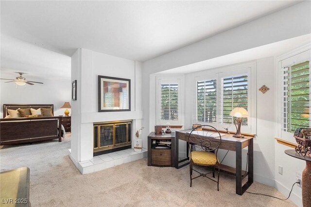 2222 Lucerne Ct, Henderson, NV 89014 - office space featuring carpet flooring, a fireplace, and a ceiling fan