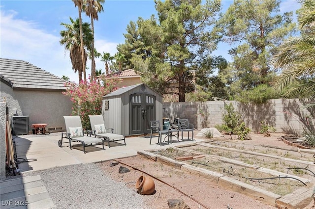 2222 Lucerne Ct, Henderson, NV 89014 - view of yard with a patio area, a vegetable garden, and central air condition unit