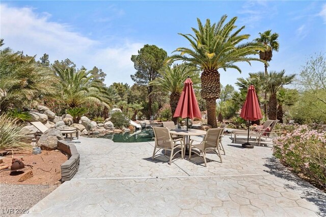 2222 Lucerne Ct, Henderson, NV 89014 - view of patio / terrace with outdoor dining area and a pool