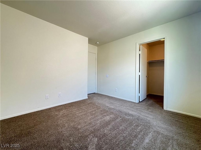 7469 Margollini St, Las Vegas, NV 89148 - unfurnished bedroom featuring carpet floors, baseboards, and a spacious closet