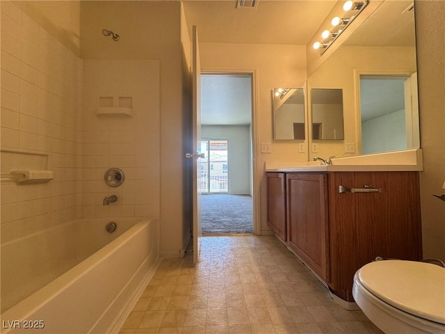 7469 Margollini St, Las Vegas, NV 89148 - full bathroom featuring vanity, bathing tub / shower combination, and toilet