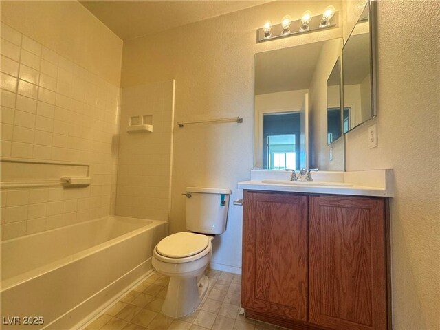 7469 Margollini St, Las Vegas, NV 89148 - full bathroom featuring toilet, a textured wall, vanity, tile patterned floors, and shower / washtub combination