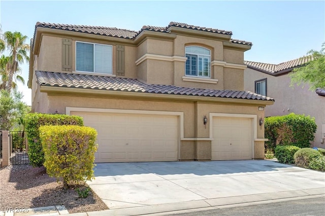 11478 Bargetto Ct, Las Vegas, NV 89141 - mediterranean / spanish-style home with an attached garage, driveway, a tiled roof, and stucco siding