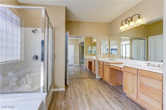 11478 Bargetto Ct, Las Vegas, NV 89141 - bathroom with a shower stall, vanity, wood finished floors, and baseboards
