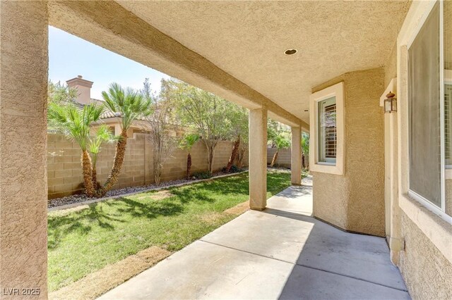 11478 Bargetto Ct, Las Vegas, NV 89141 - fenced backyard featuring a patio area