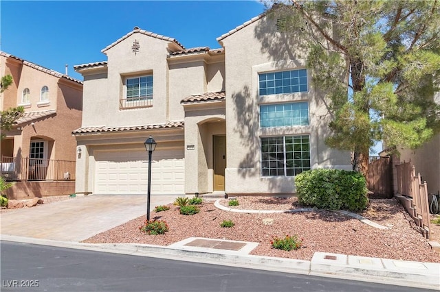4016 Owlshead Mountain St, Las Vegas, NV 89129 - view of front of home with a tiled roof, stucco siding, an attached garage, and driveway