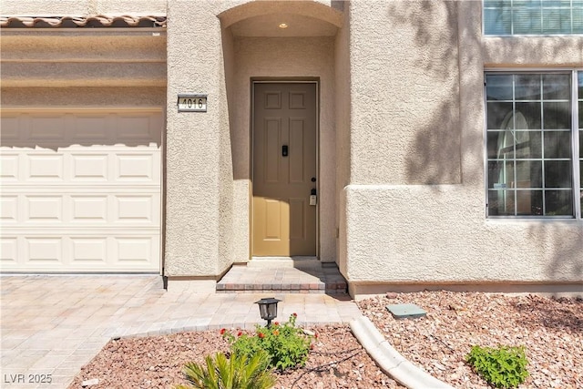 4016 Owlshead Mountain St, Las Vegas, NV 89129 - entrance to property with stucco siding and a garage