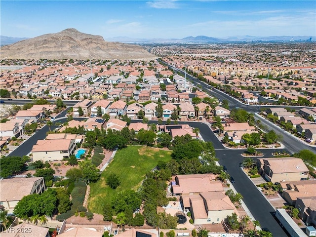 4016 Owlshead Mountain St, Las Vegas, NV 89129 - aerial overview of property's location featuring a mountain backdrop and nearby suburban area