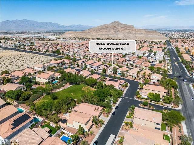 4016 Owlshead Mountain St, Las Vegas, NV 89129 - aerial view of property's location featuring a mountain backdrop and nearby suburban area