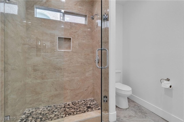 4016 Owlshead Mountain St, Las Vegas, NV 89129 - bathroom with toilet, a shower stall, and baseboards