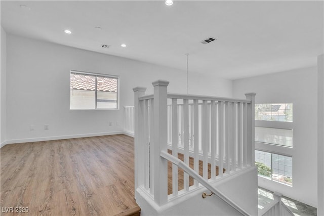 4016 Owlshead Mountain St, Las Vegas, NV 89129 - corridor featuring healthy amount of natural light, light wood-type flooring, recessed lighting, and baseboards