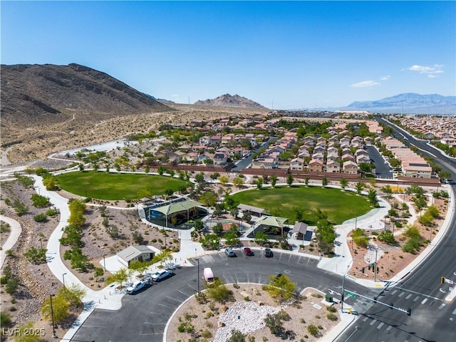 4016 Owlshead Mountain St, Las Vegas, NV 89129 - aerial view of property and surrounding area with a mountainous background and nearby suburban area